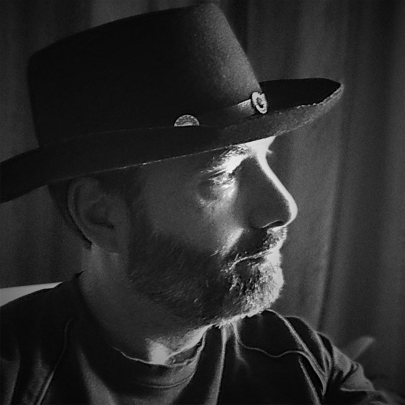Stephen K. Roberts in cowboy hat.